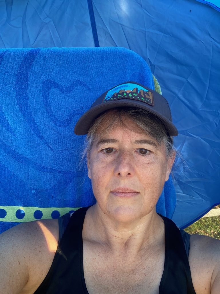 Taking a break in the shade on a hot September run, where I had plenty of chafing, despite not running in cotton. 