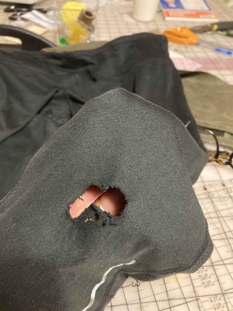 Running tights with a large hole